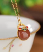 S925 Pocket South Red Agate Pendant